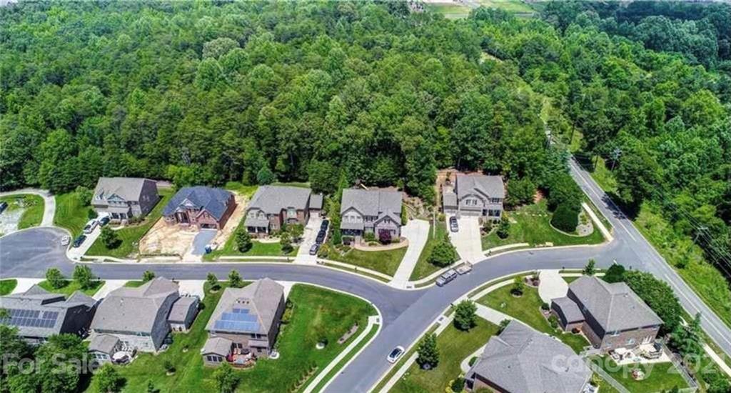 693 Old Cove Road Tega Cay, SC 29708 - Photo 38 of 38 an aerial view of residential house with outdoor space and patio