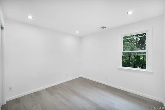 a kitchen with kitchen island a stove a sink and a refrigerator