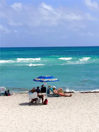 a view of a lake and front yard