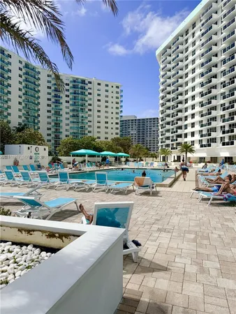 a outdoor space with lots of car parked