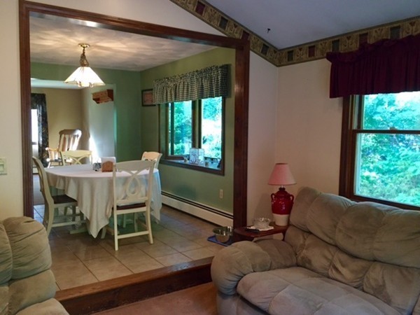 30 Douglas Road Dracut, MA 01826 - Photo 5 of 14 a living room with furniture and a large window
