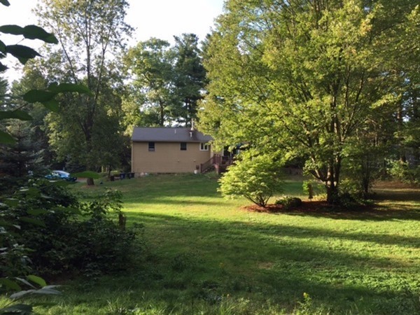 30 Douglas Road Dracut, MA 01826 - Photo 10 of 14 a view of a trees in a yard