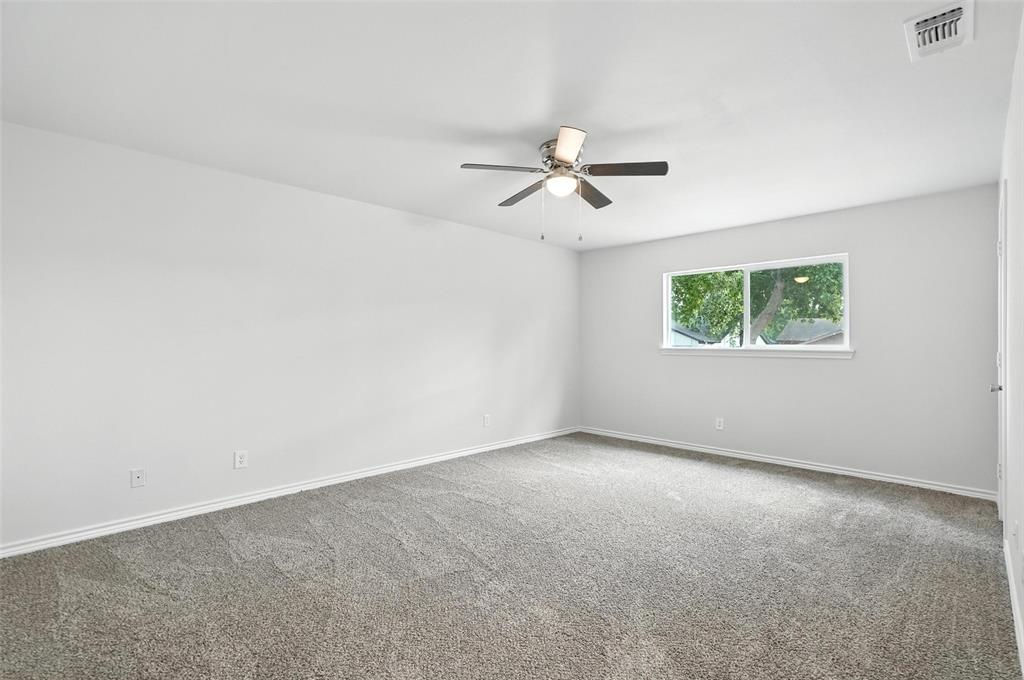 4613 Tarry Drive Garland, TX 75043 - Photo 18 of 38 a view of an empty room with a window