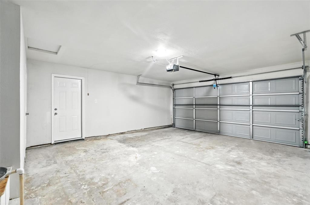 4613 Tarry Drive Garland, TX 75043 - Photo 34 of 38 a view of a garage