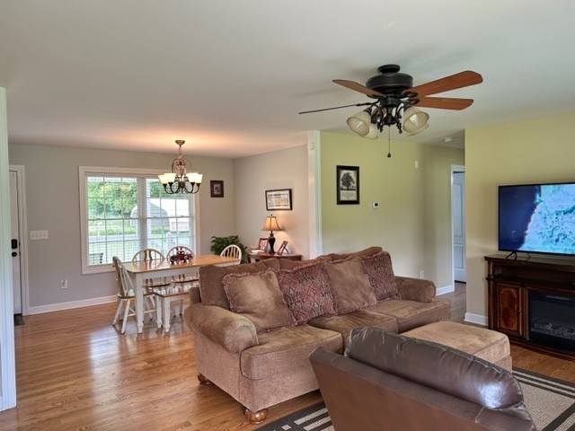 2244 Baptist Branch Road Mount Pleasant, TN 38474 - Photo 39 of 47 a living room with furniture and a fireplace