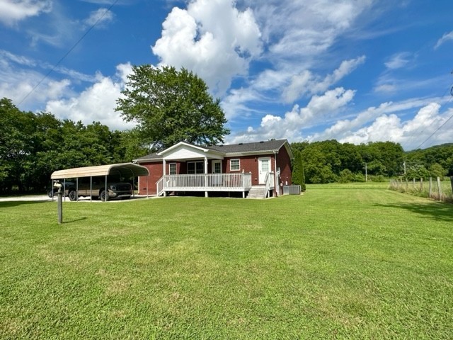 2244 Baptist Branch Road Mount Pleasant, TN 38474 - Photo 9 of 47 a view of a house with a backyard