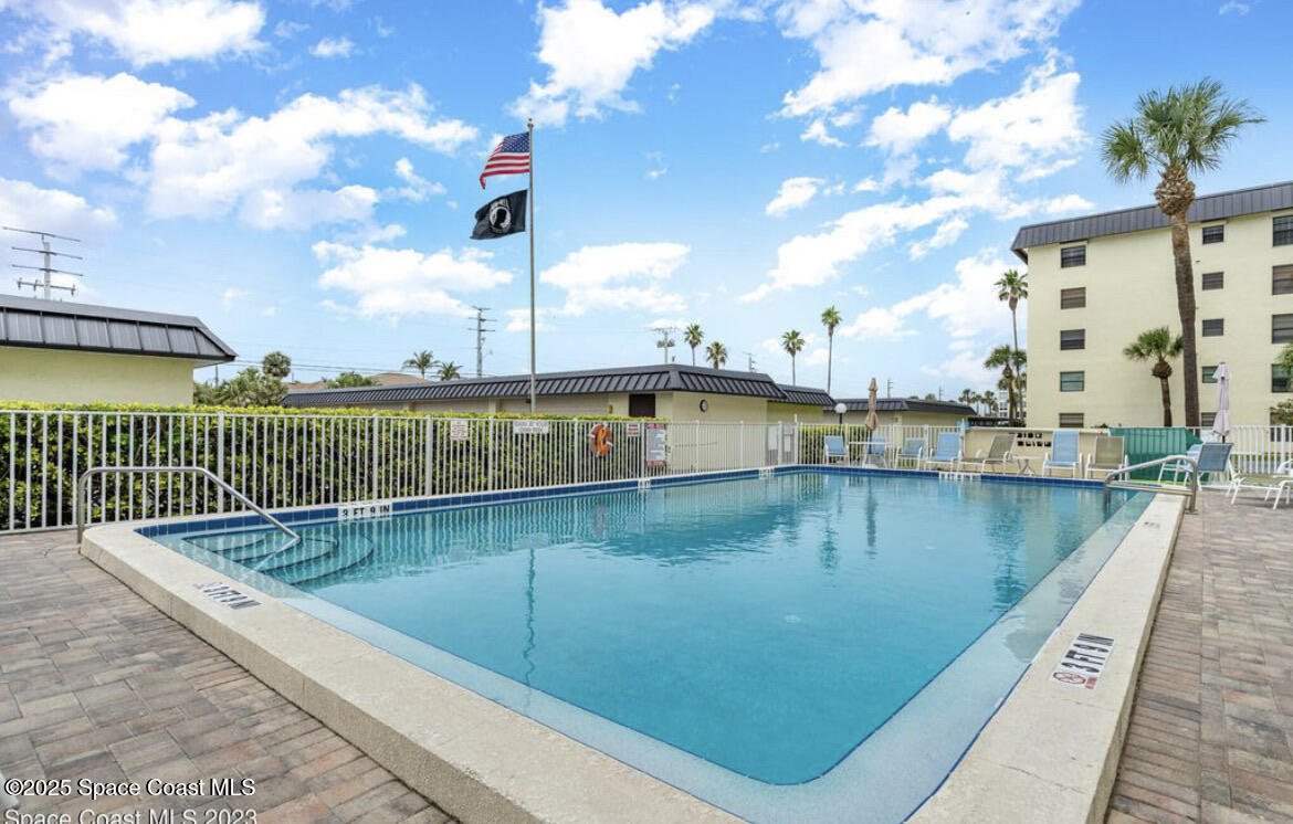 4570 Ocean Beach Boulevard, Unit 104 Cocoa Beach, FL 32931 - Photo 17 of 18 a view of a balcony with lake view