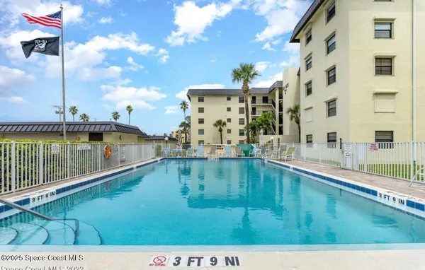 a view of a balcony with an ocean view