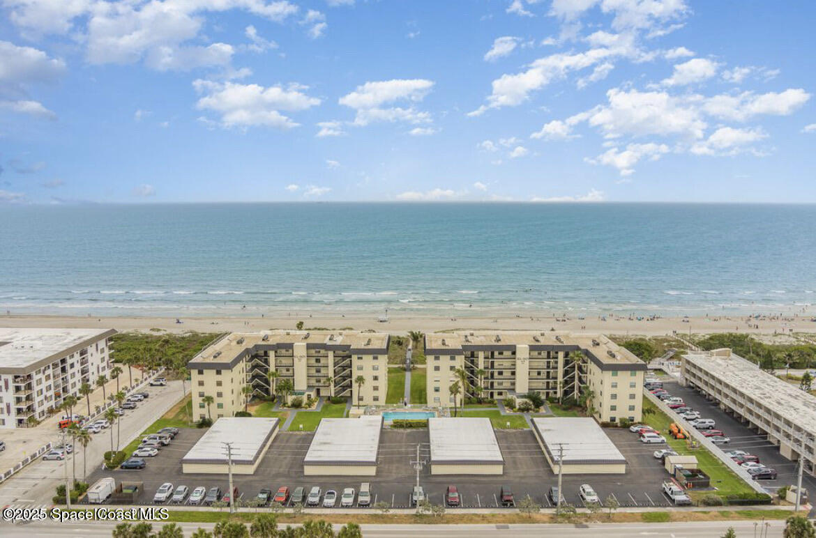 4570 Ocean Beach Boulevard, Unit 104 Cocoa Beach, FL 32931 - Photo 3 of 18 a view of an ocean and beach