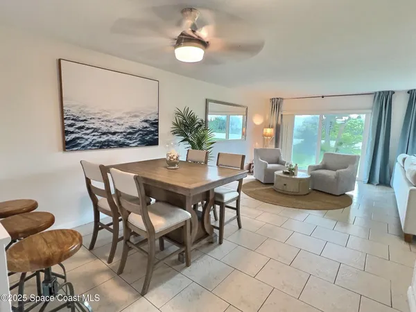 a view of a livingroom and dining room