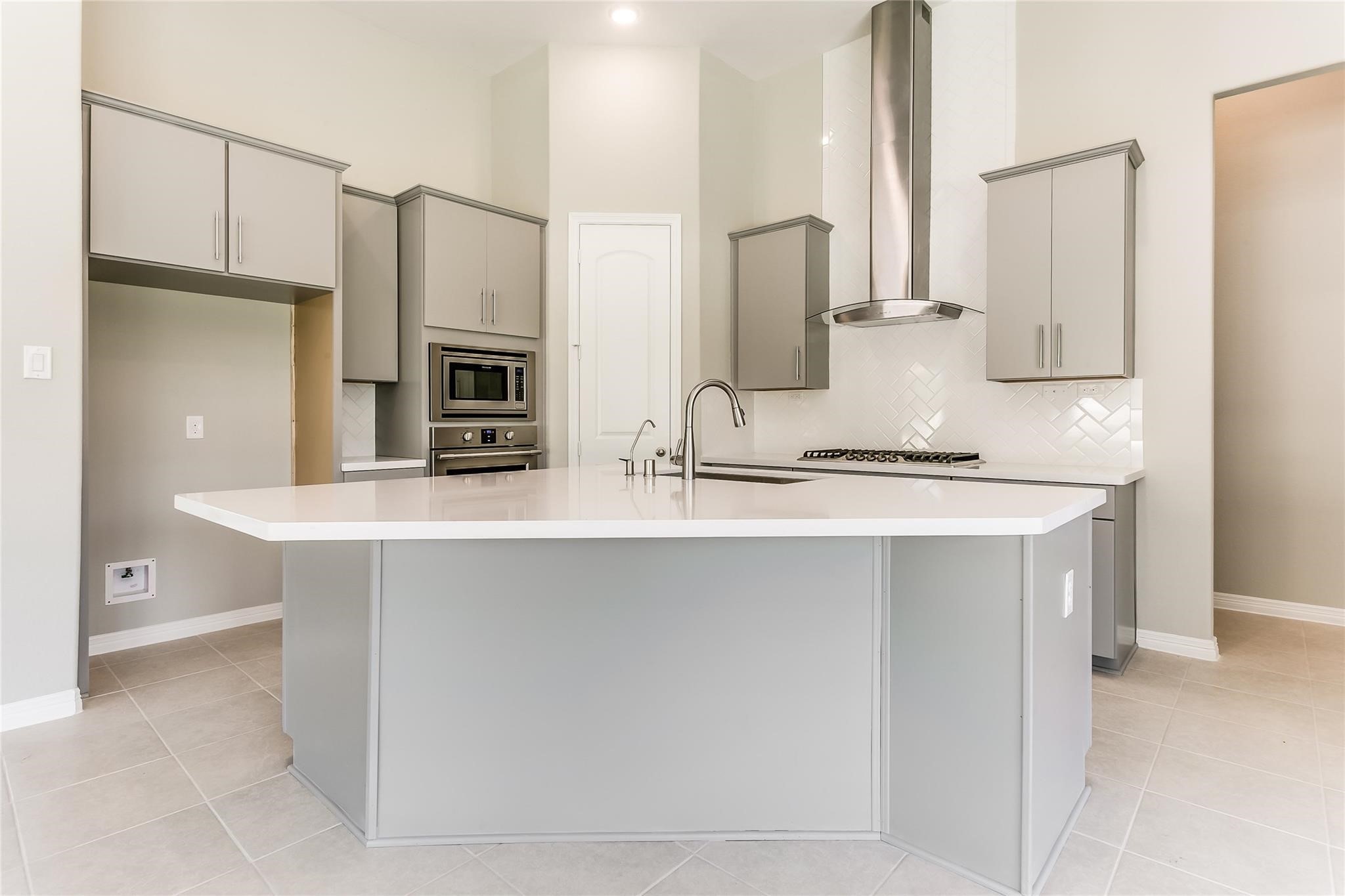 4227 Carol Ridge Drive Sugar Land, TX 77479 - Photo 11 of 35 a kitchen with stainless steel appliances a sink and refrigerator