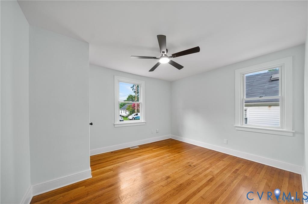 2105 Clarke Street Henrico, VA 23228 - Photo 13 of 26 a view of empty room with wooden floor and fan