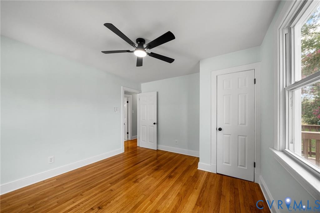 2105 Clarke Street Henrico, VA 23228 - Photo 15 of 26 a view of empty room with wooden floor and fan