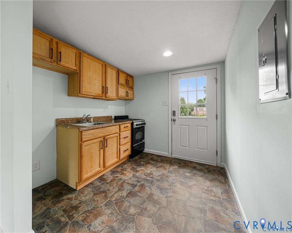 2105 Clarke Street Henrico, VA 23228 - Photo 18 of 26 a view of a kitchen with electric appliances