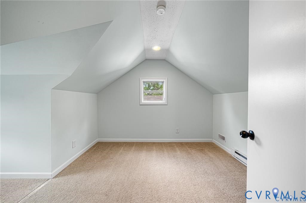 2105 Clarke Street Henrico, VA 23228 - Photo 19 of 26 an empty room with a window