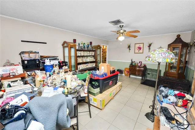 a living room with lots of furniture and toys