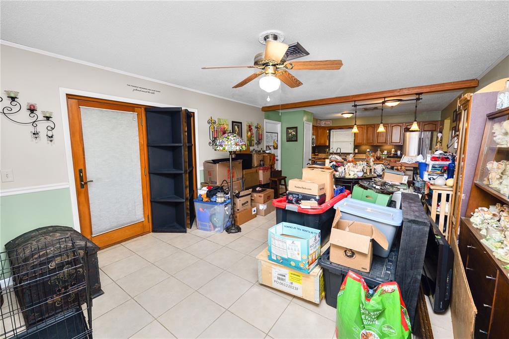 3075 Flamingo Lane Mulberry, FL 33860 - Photo 13 of 30 a bedroom with furniture and a ceiling fan