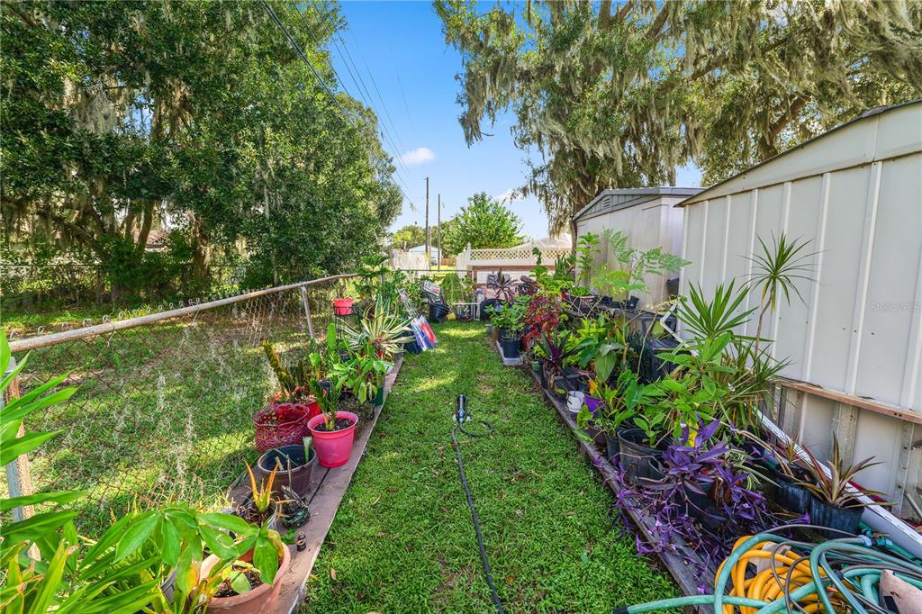 3075 Flamingo Lane Mulberry, FL 33860 - Photo 20 of 30 a view of swings in a backyard