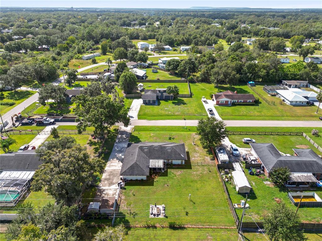 3075 Flamingo Lane Mulberry, FL 33860 - Photo 26 of 30 a view of a town with swimming pool
