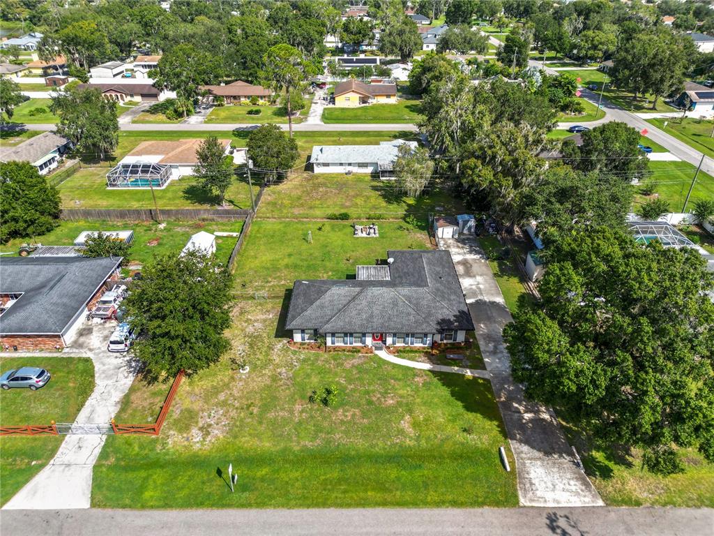 3075 Flamingo Lane Mulberry, FL 33860 - Photo 29 of 30 an aerial view of a residential houses with outdoor space