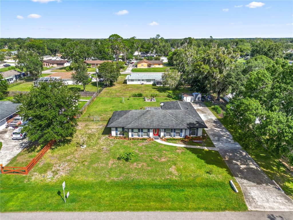 3075 Flamingo Lane Mulberry, FL 33860 - Photo 30 of 30 an aerial view of a house with a yard