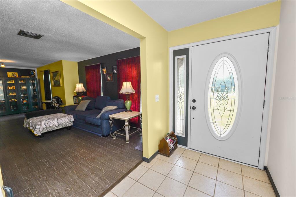 3075 Flamingo Lane Mulberry, FL 33860 - Photo 4 of 30 a living room with furniture and a window