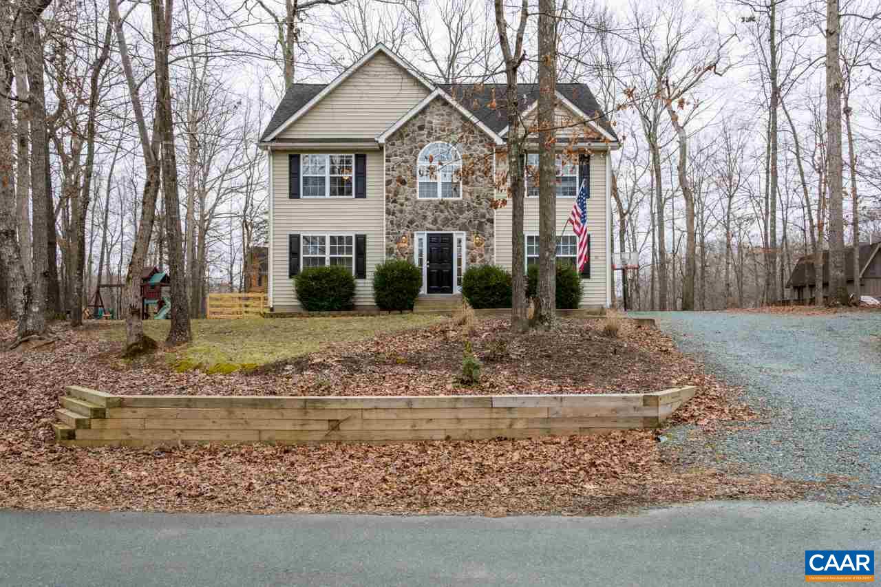 30 Amethyst Road Palmyra, VA 22963 - Photo 1 of 37 a front view of a house with a yard