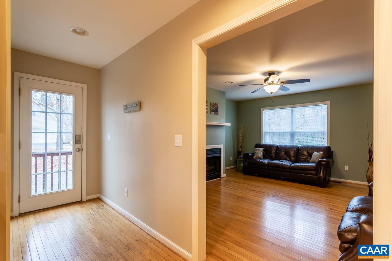 30 Amethyst Road Palmyra, VA 22963 - Photo 11 of 37 a living room with furniture and a wooden floor