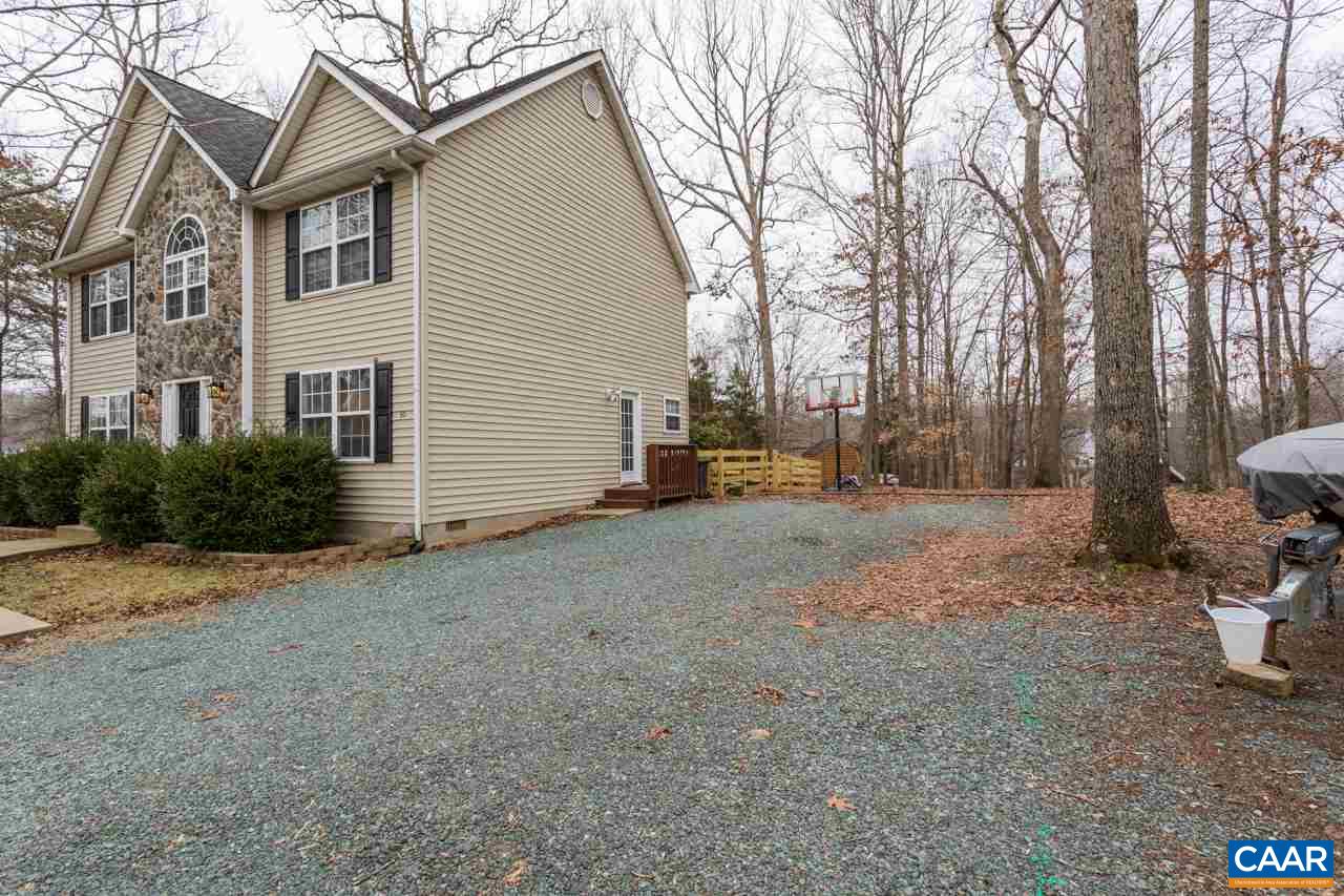 30 Amethyst Road Palmyra, VA 22963 - Photo 2 of 37 a view of a house with a yard covered in snow