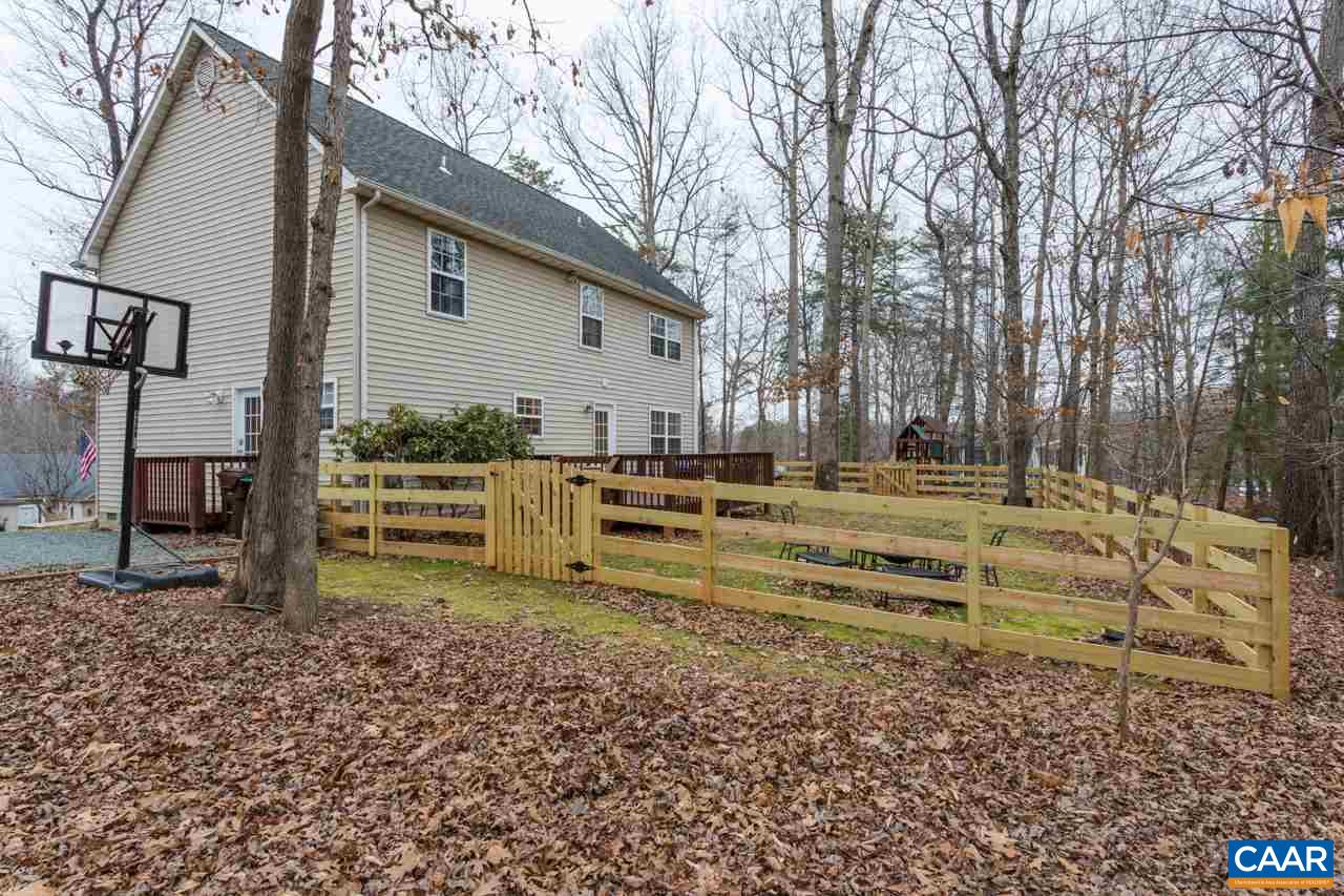 30 Amethyst Road Palmyra, VA 22963 - Photo 29 of 37 a backyard of a house with barbeque oven and outdoor seating