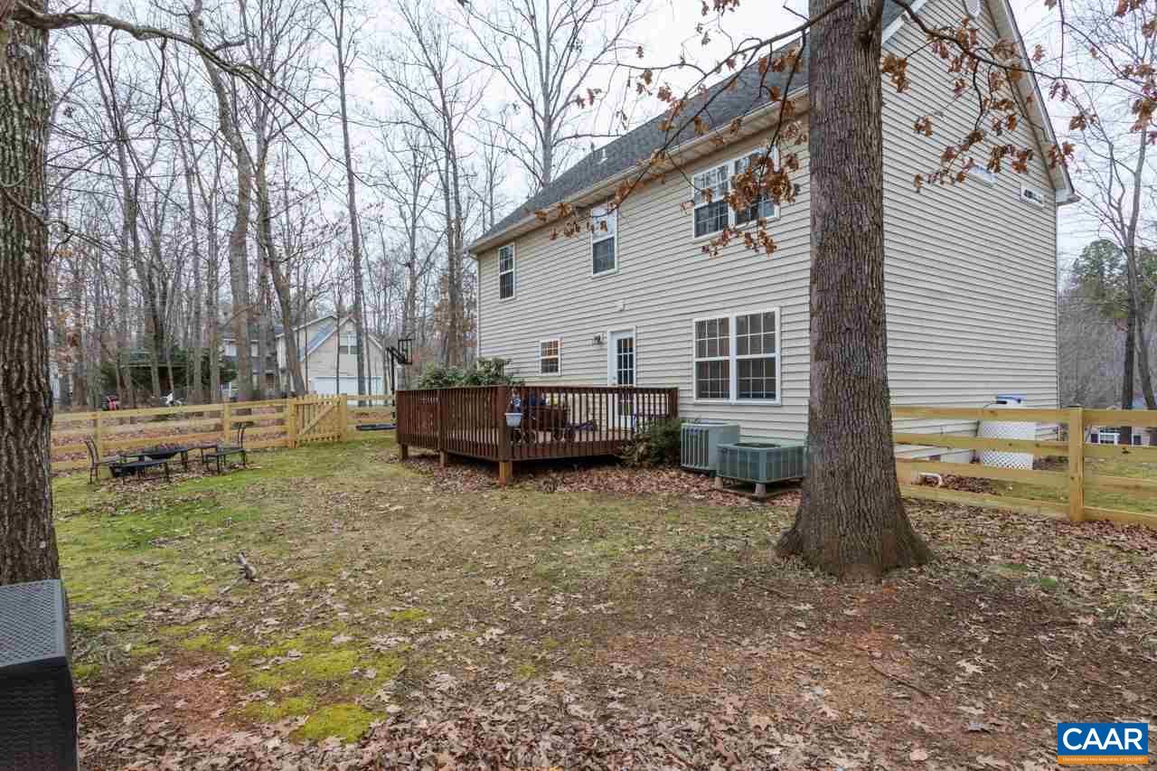 30 Amethyst Road Palmyra, VA 22963 - Photo 31 of 37 a view of a house with a backyard and trees