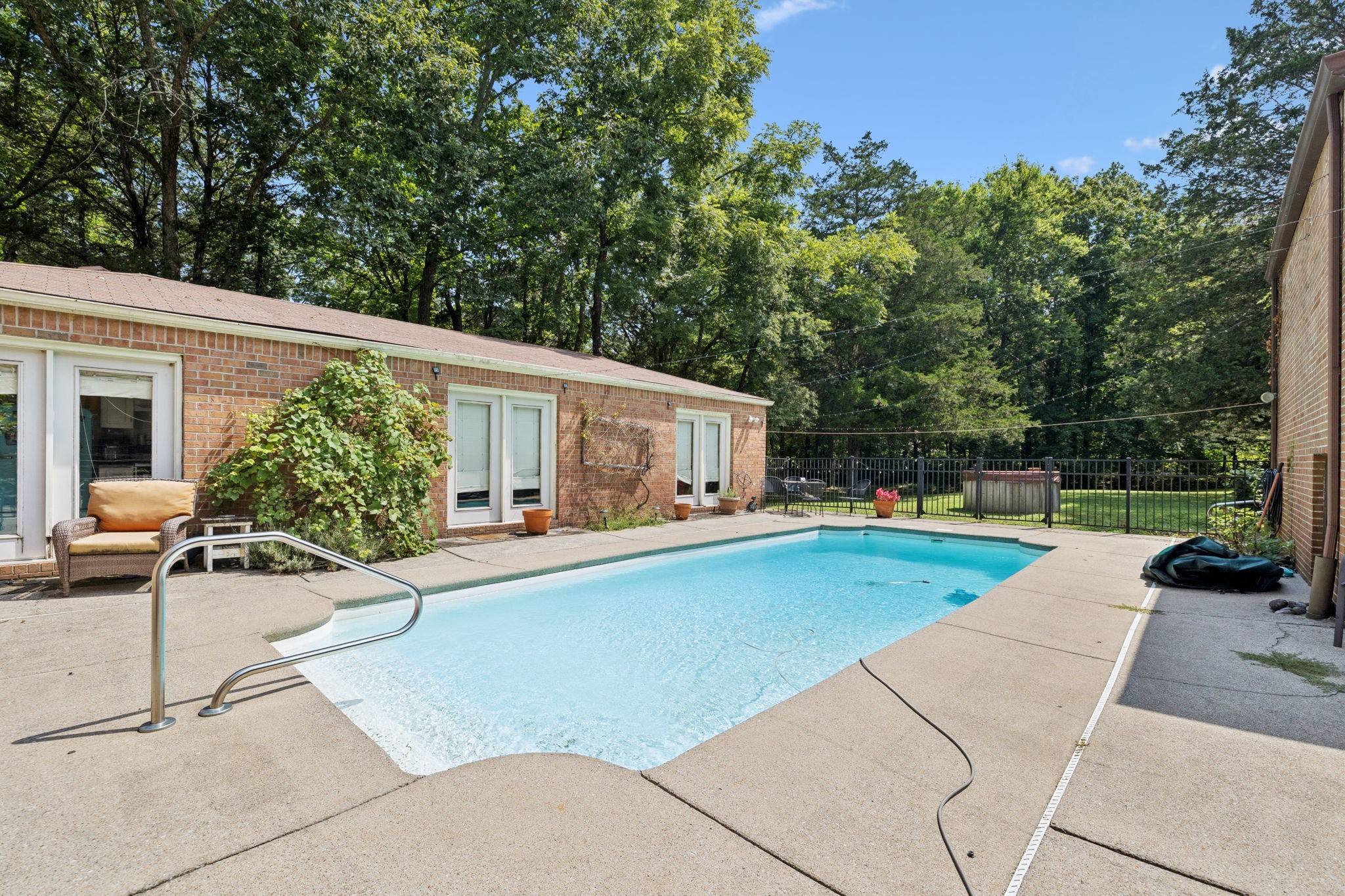 1030 Waller Road Brentwood, TN 37027 - Photo 11 of 90 a view of a house with swimming pool and sitting area