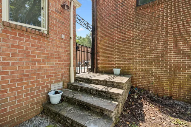 a view of outdoor space with trees all around