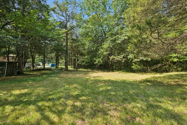 a kitchen with a sink and a window