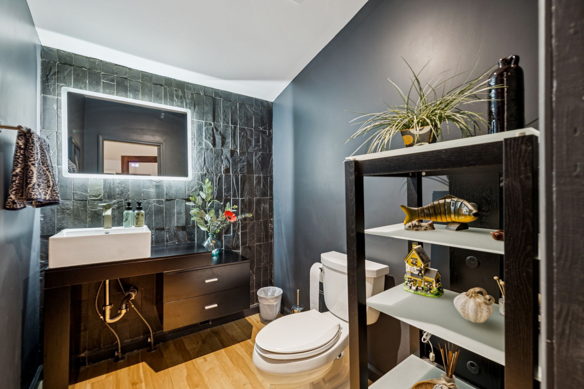 1030 Waller Road Brentwood, TN 37027 - Photo 28 of 90 a bathroom with a sink a toilet and a mirror