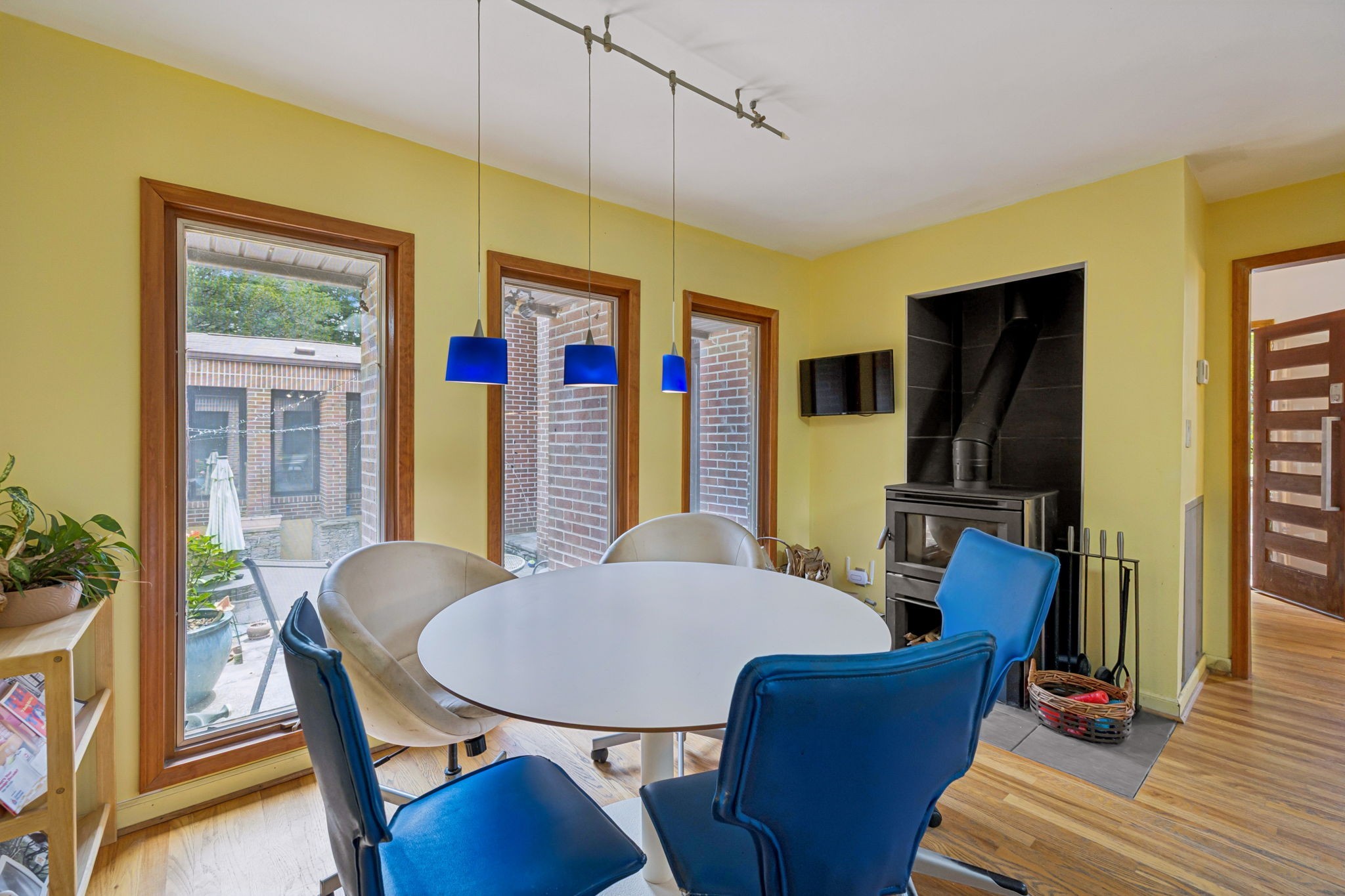 1030 Waller Road Brentwood, TN 37027 - Photo 35 of 90 a view of a dining room with furniture window and wooden floor