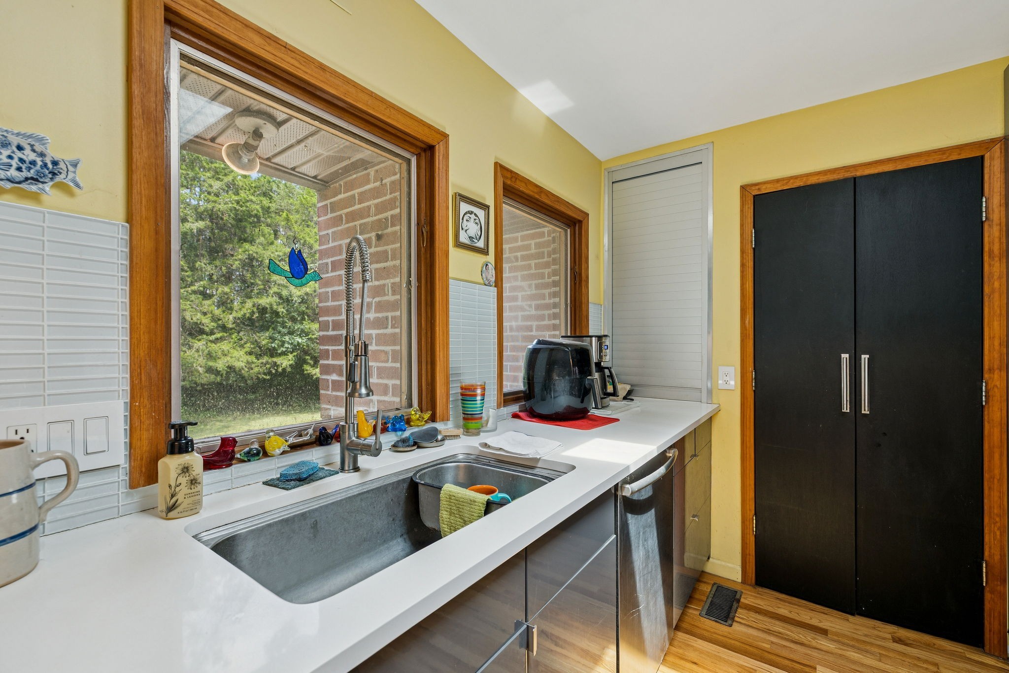 1030 Waller Road Brentwood, TN 37027 - Photo 36 of 90 a kitchen with a sink and a window