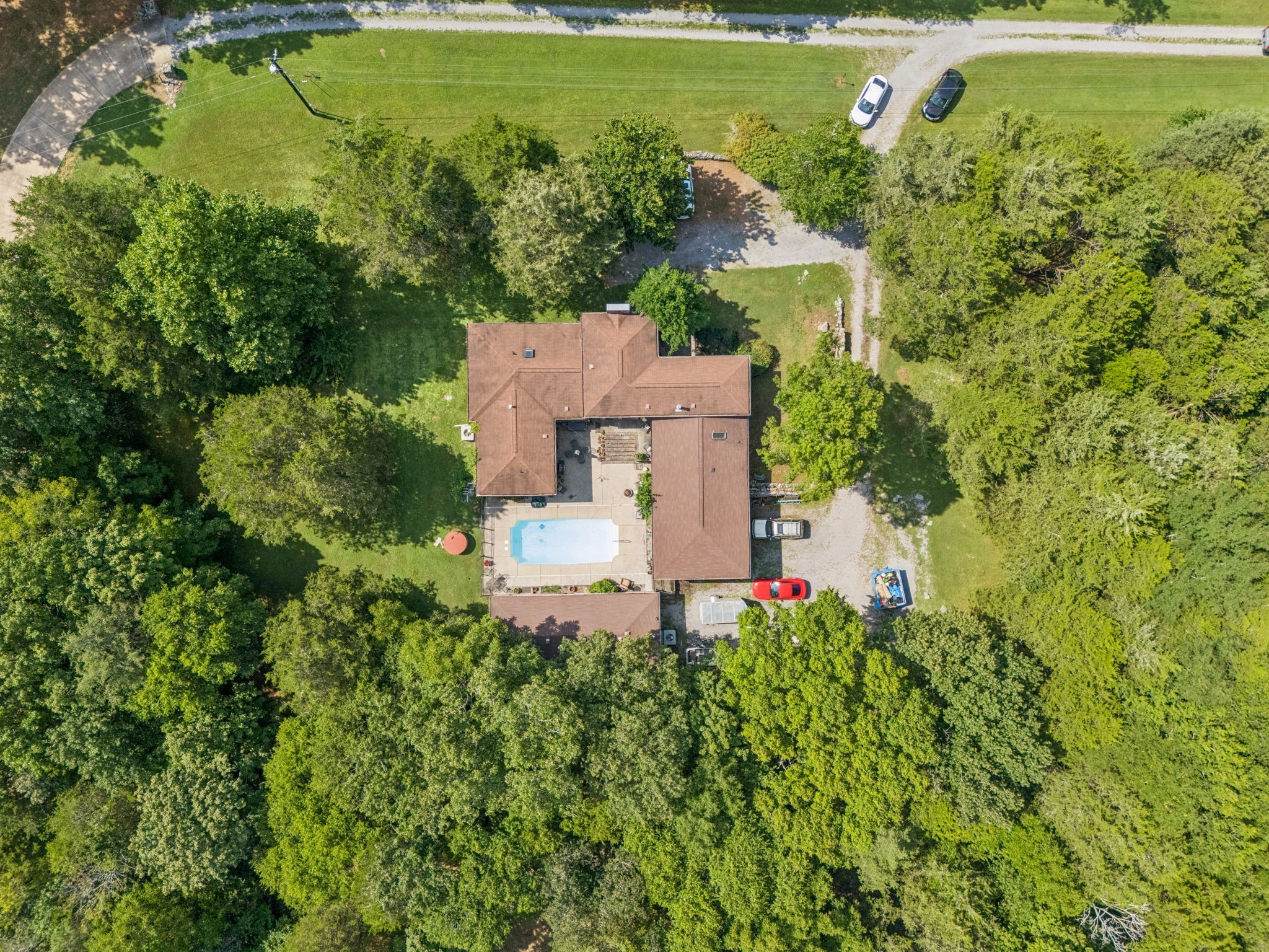 1030 Waller Road Brentwood, TN 37027 - Photo 4 of 90 an aerial view of a house with a yard swimming pool outdoor seating and yard