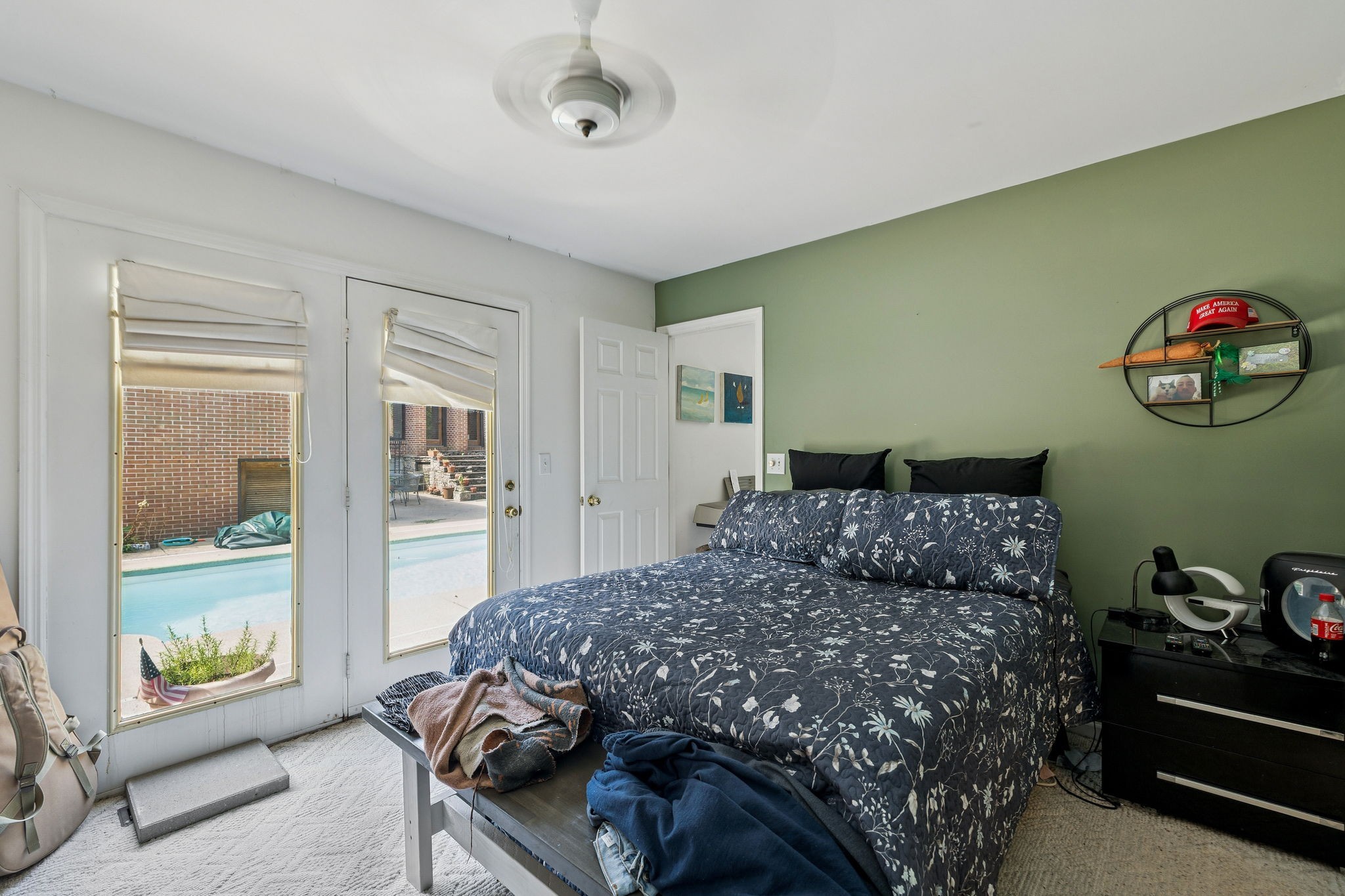 1030 Waller Road Brentwood, TN 37027 - Photo 69 of 90 a bedroom with a bed and dresser with mirror