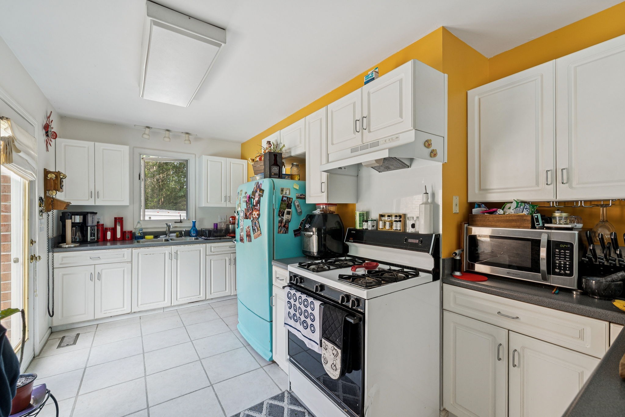1030 Waller Road Brentwood, TN 37027 - Photo 81 of 90 a kitchen with stainless steel appliances a stove a sink and cabinets