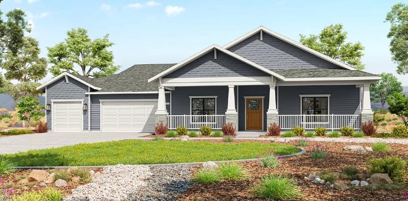 a front view of a house with a yard and porch