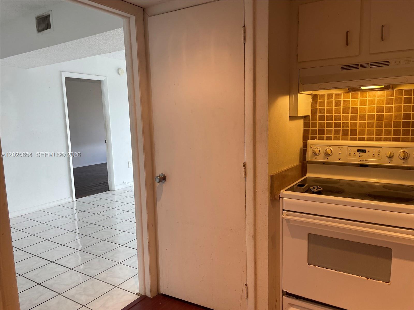 4174 Inverrary Drive, Unit 903 Lauderhill, FL 33319 - Photo 14 of 36 a view of kitchen and utility room