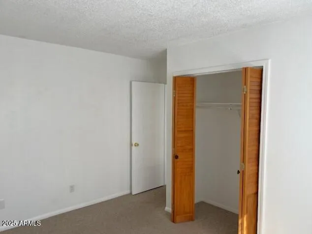 a view of an empty room with window