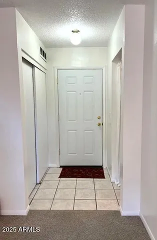 a view of entryway with front door