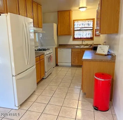 a kitchen with stainless steel appliances a stove and a refrigerator