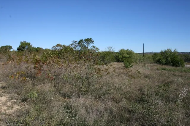 a view of a city and mountains in the background