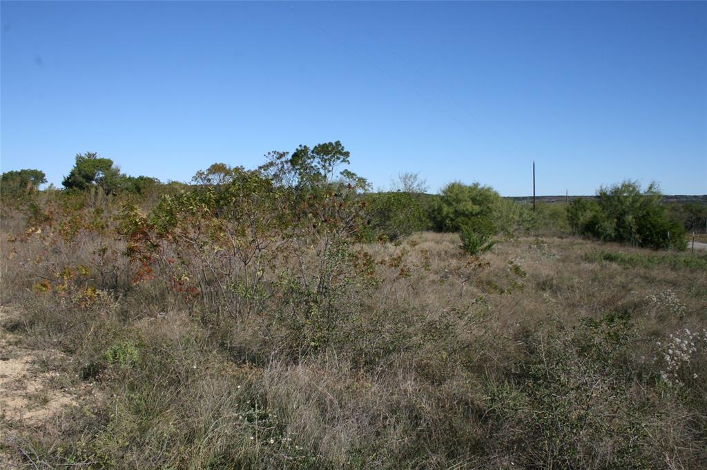 0 Upper Brad Road Strawn, TX 76475 - Photo 6 of 26 a view of a city and mountains in the background