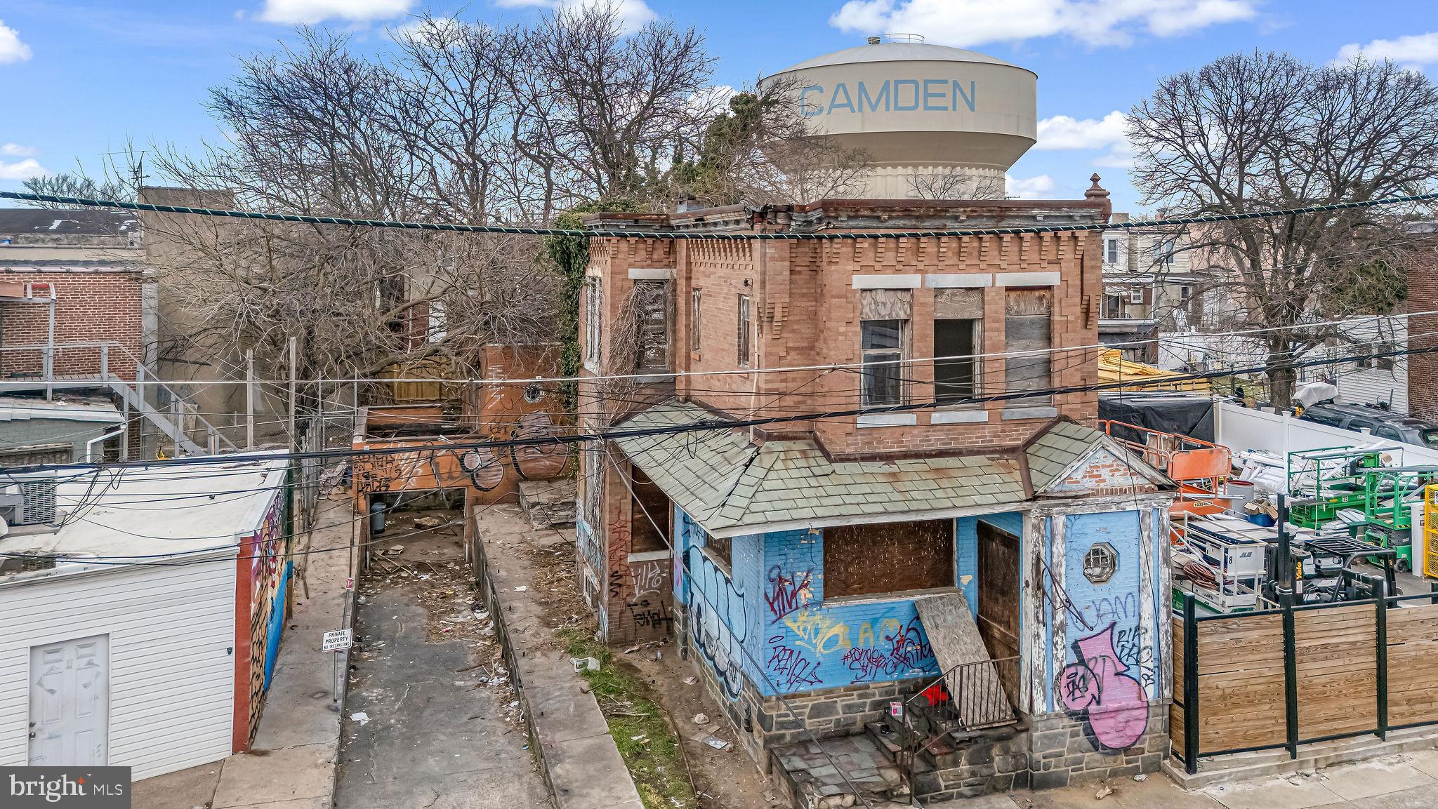 a front view of a house with parking space
