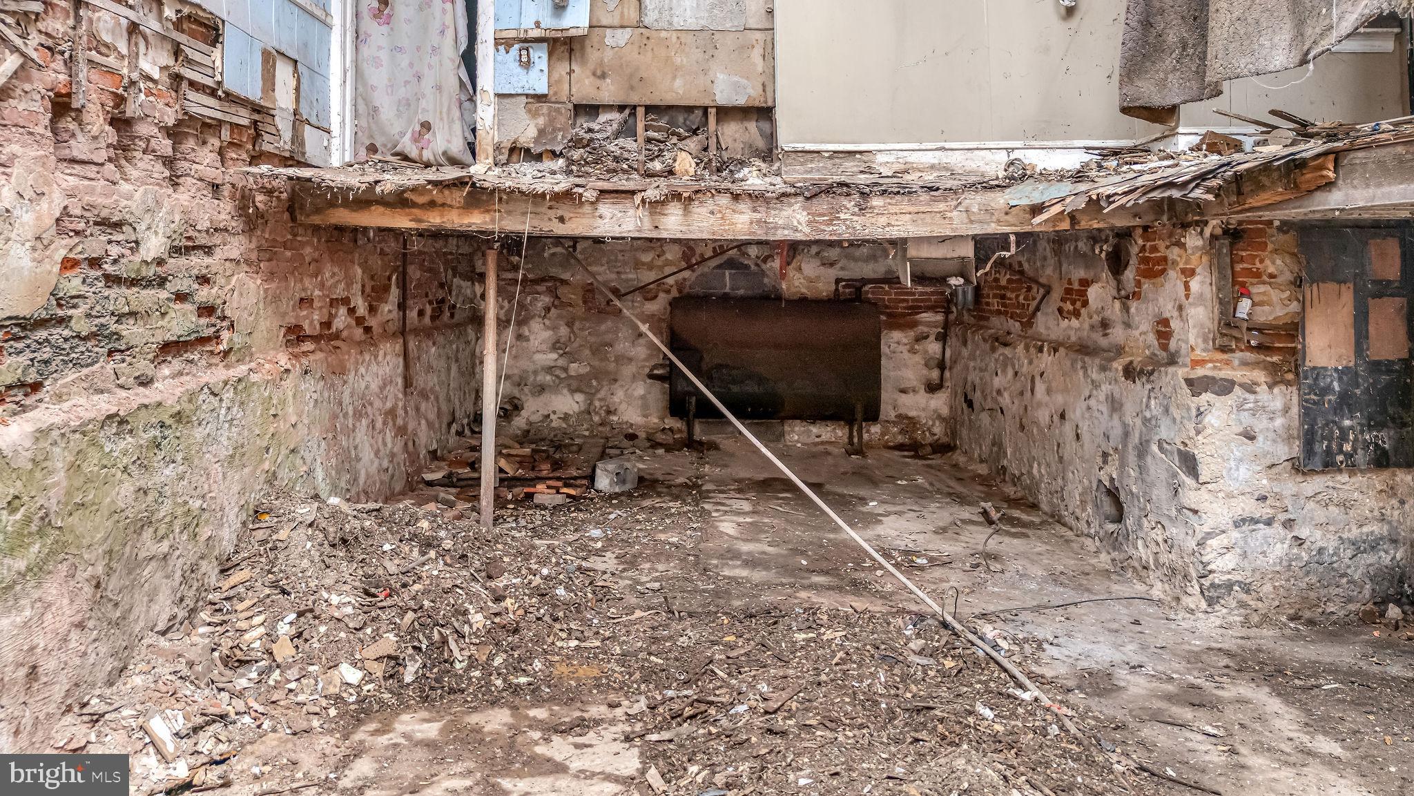 1145 Thurman Street Camden, NJ 08104 - Photo 11 of 18 a view of a backyard with table and chairs