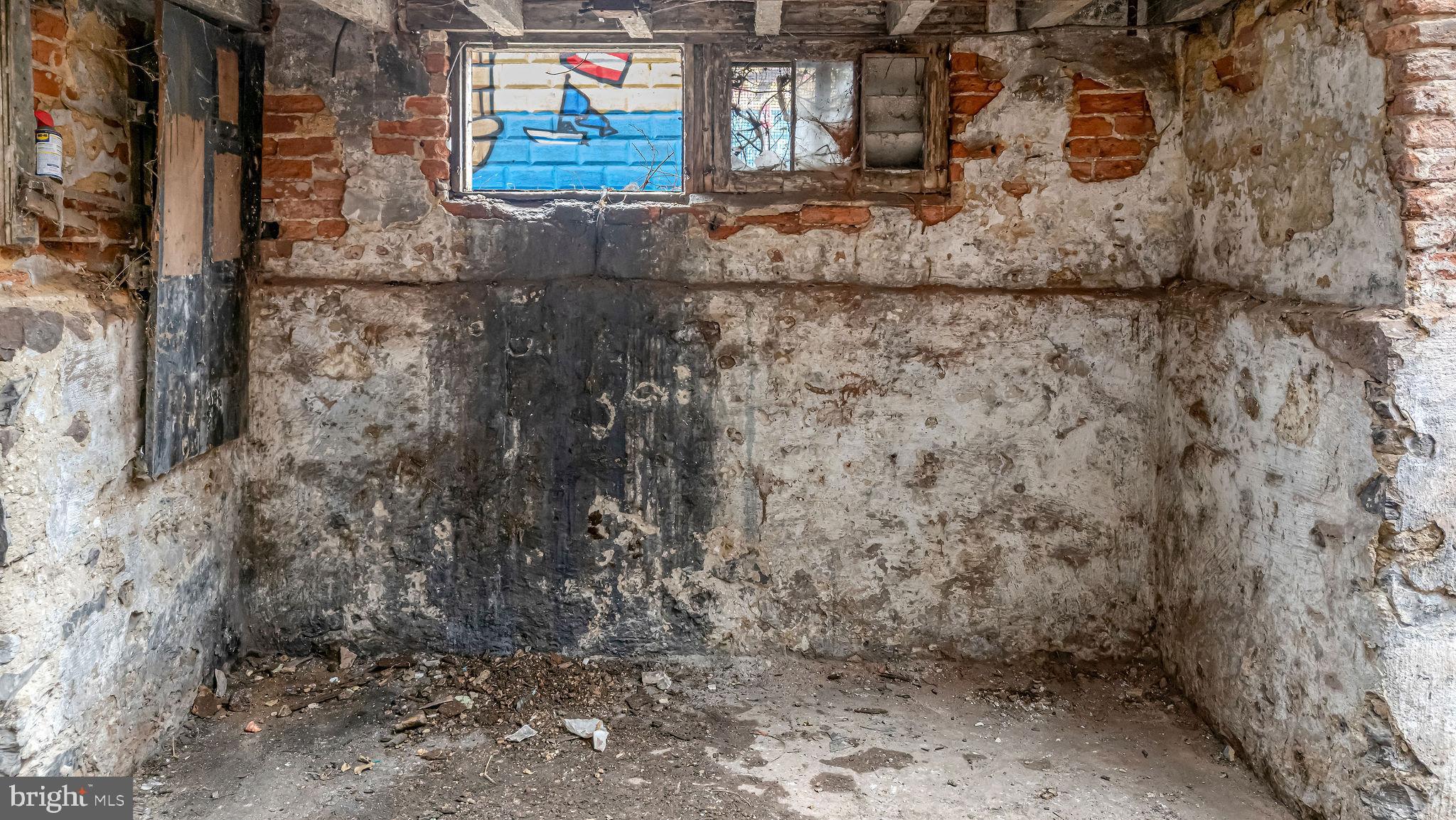 1145 Thurman Street Camden, NJ 08104 - Photo 17 of 18 a view of a dry yard